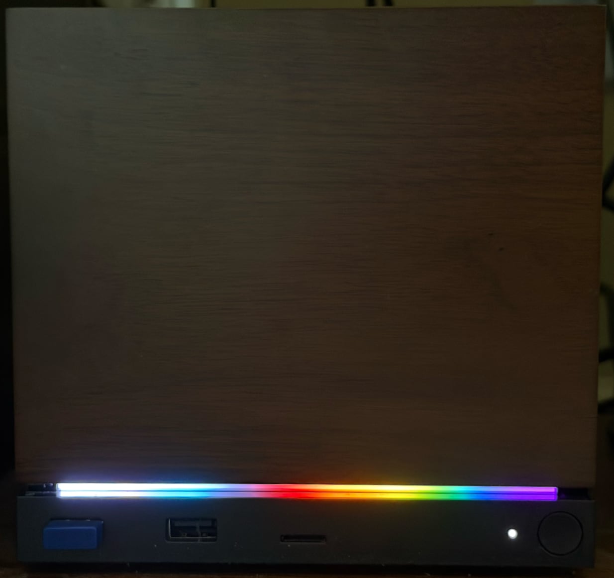 The front of a Steam Machine showing pretty colors on the LED light bar